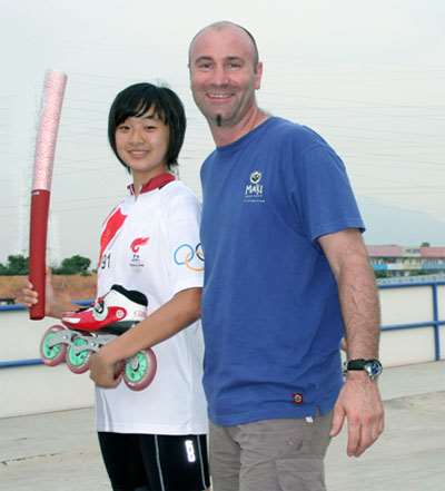 Christophe Audoire et une patineuse course chinoise