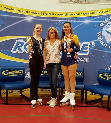 Elisabet Martin Mora and two artistic inline figure skaters