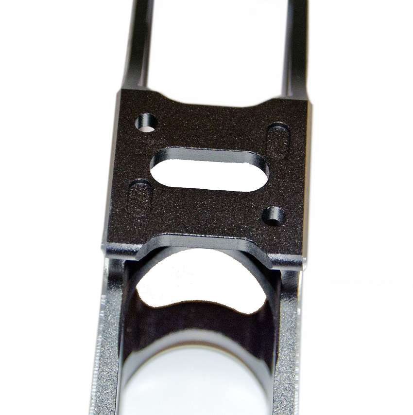 Platine Powerslide Triple X 3x125 mm Pont de la platine Powerslide Triple X 3x125 mm avec les cavités pour accueillir les cales
